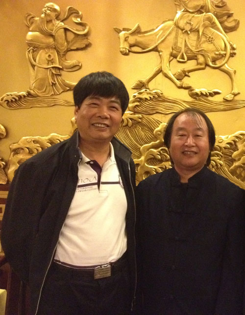 与淮北师范大学美术学院副院长、教授罗耀东合影
